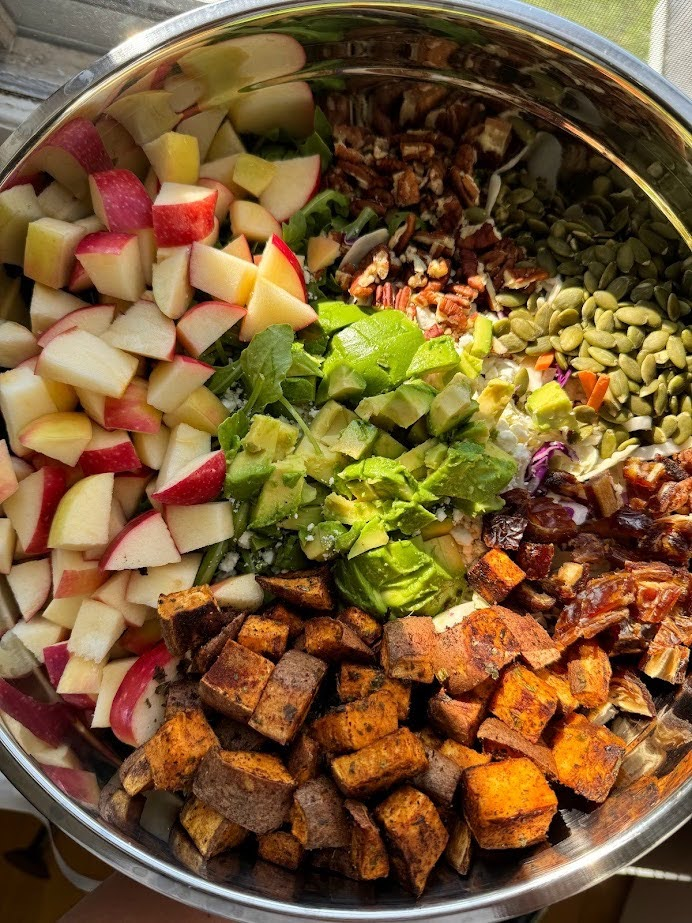 Colorful veggies and fall salad in a bowl